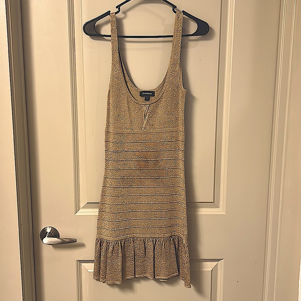 Bebe body-con figure hugging gold sparkly dress size small.